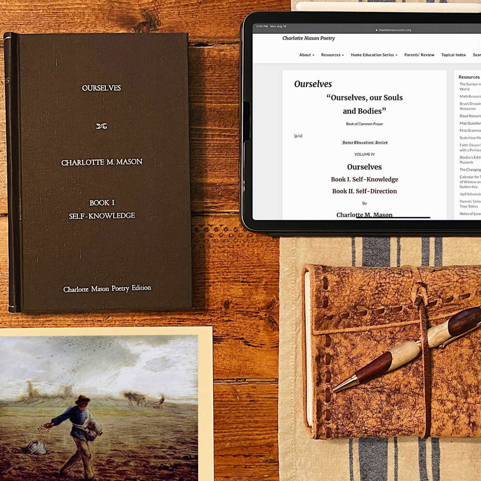 Brown hardcover book titled 'OURSELVES' sits on a wooden table beside a tablet showing a Charlotte Mason Poetry webpage with the heading 'Ourselfs, our Souls and Bodies' on a white page.
