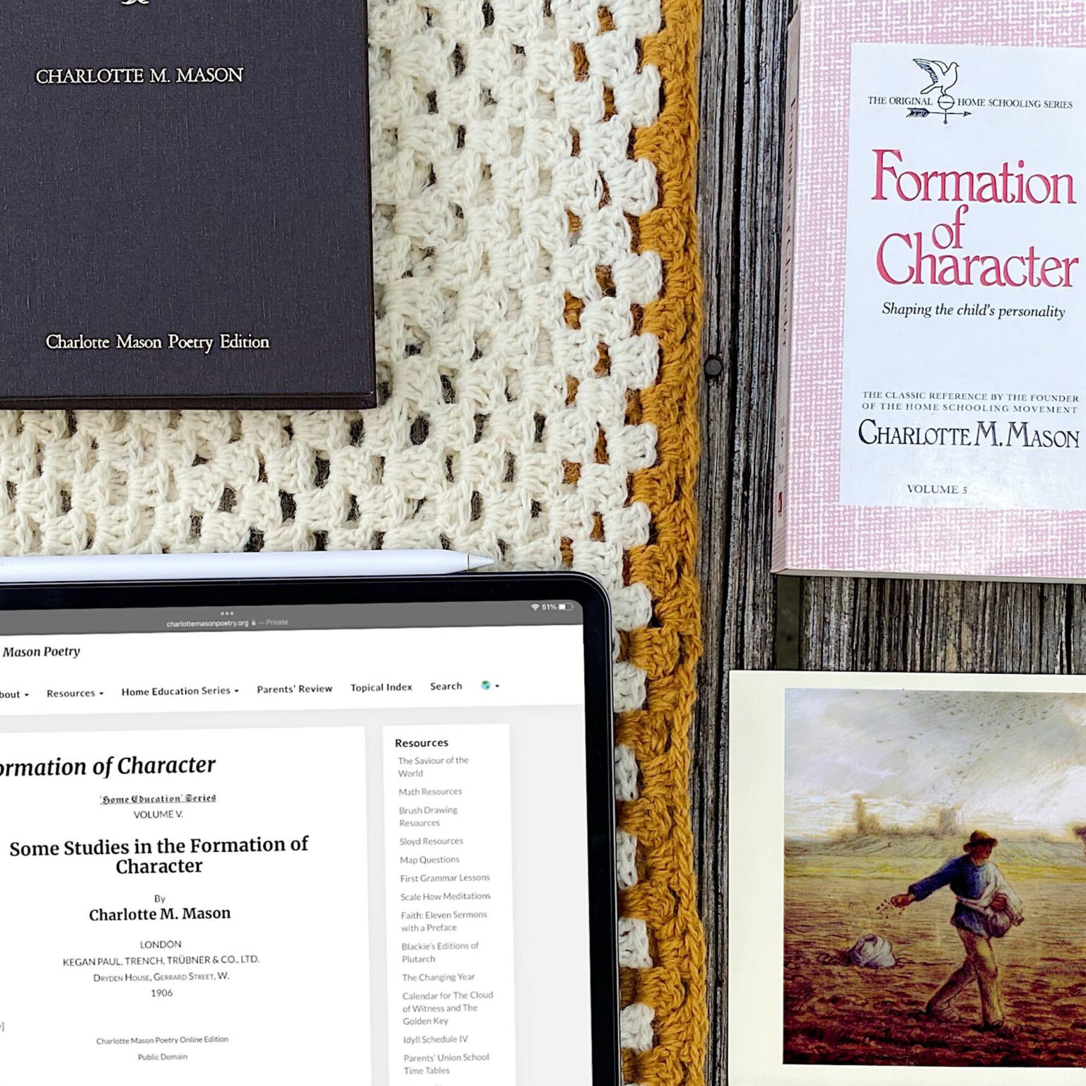 Collage of a dark purple Charlotte Mason poetry book, a crocheted cream and mustard blanket, a wooden surface, and a pink-formatted booklet titled Formation of Character with a tablet displaying a website.