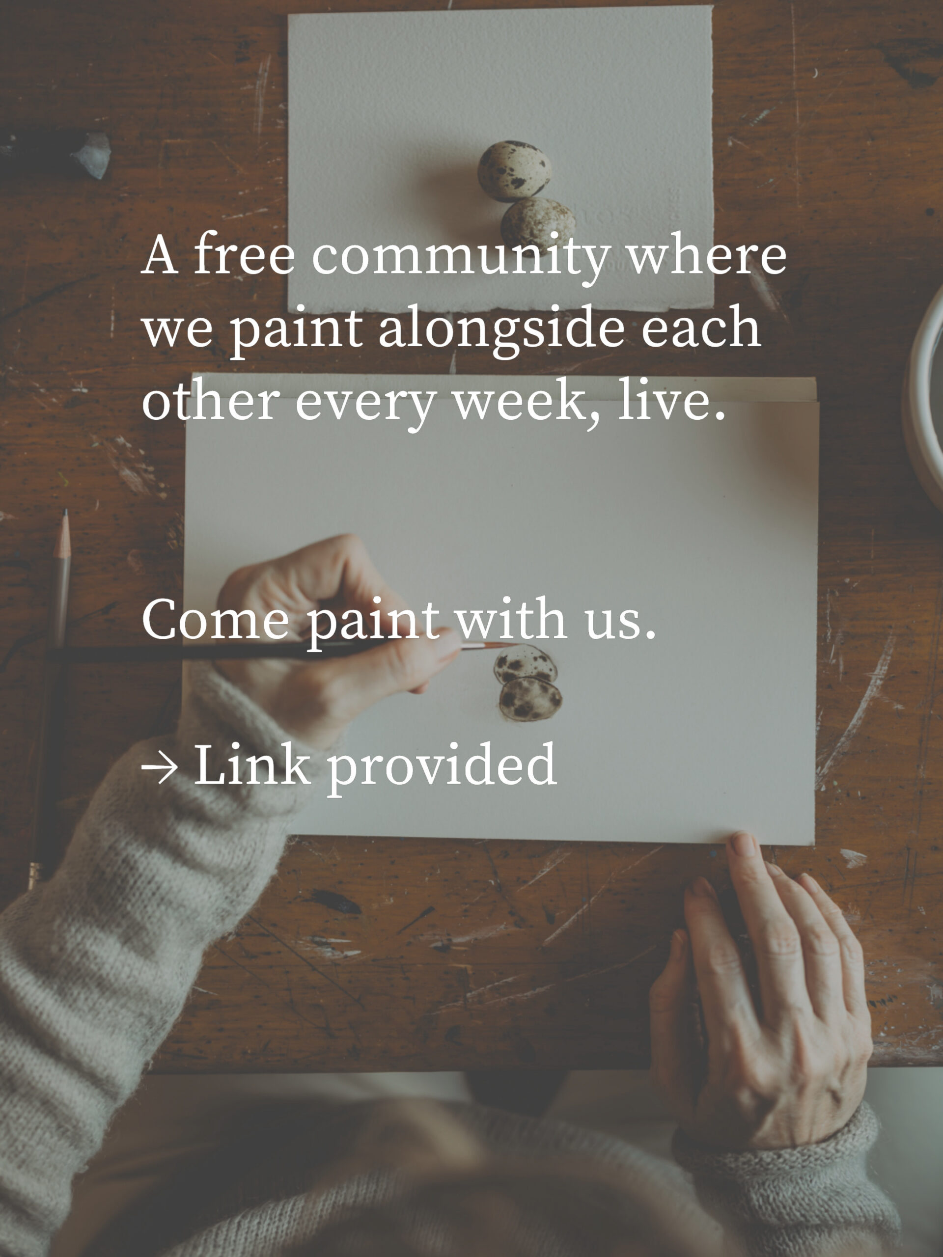Overhead view of hands painting on a white sheet on a wooden table; large white text invites joining a weekly live painting community.